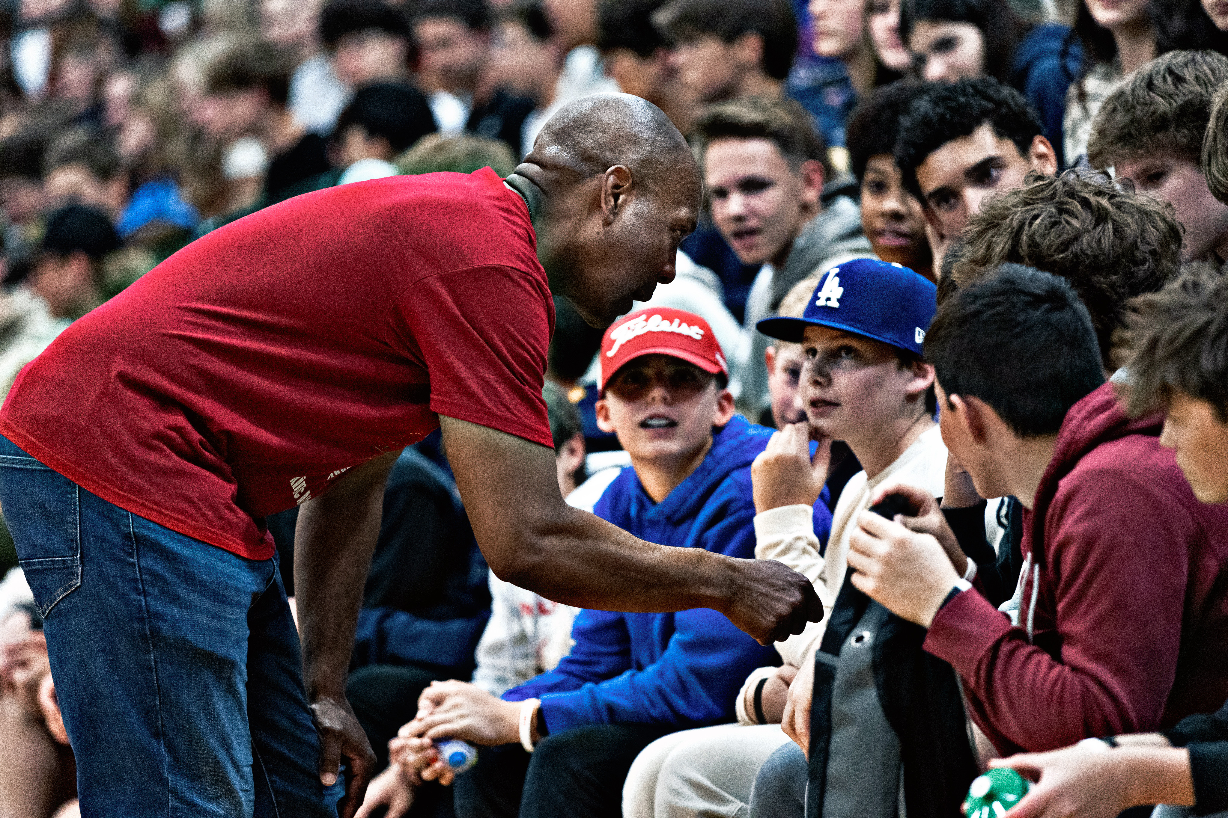 Coach Pete speaking with students